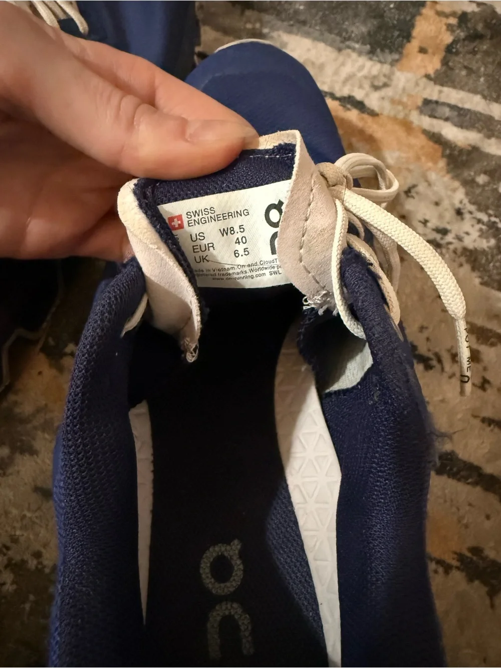 On Running Women’s Cloudrunner Athletic Shoes in Navy and Cream